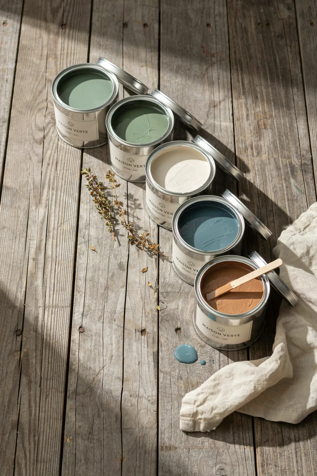 The Rustic Farmhouse Paint Palette — paint cans and swatches flat lay